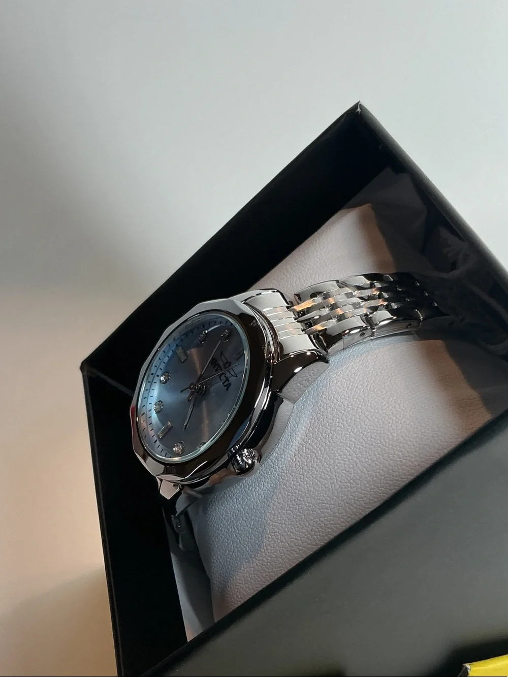 Invicta women’s Silver Watch with Light Blue Dial and Crystal Markers